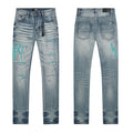 AMIRI Turquoise Embroidered Light Blue Jeans — hero