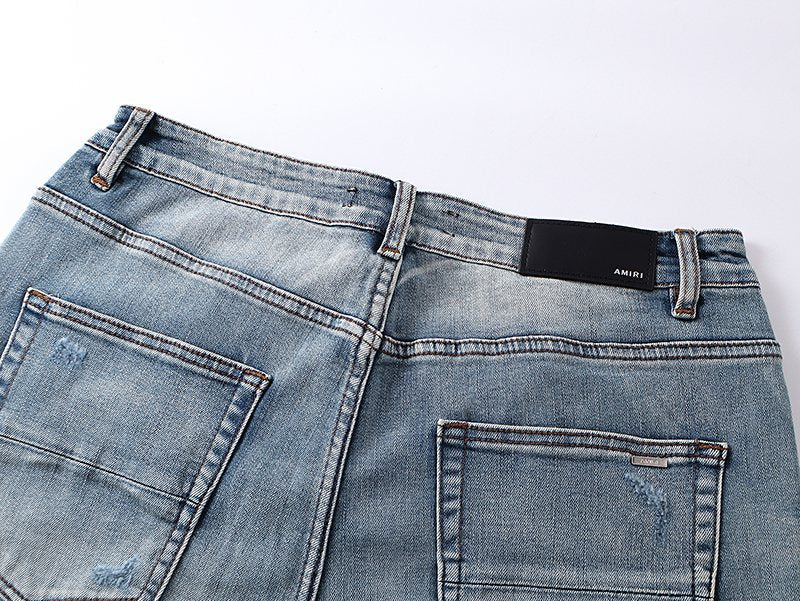 AMIRI Turquoise Embroidered Light Blue Jeans — detail