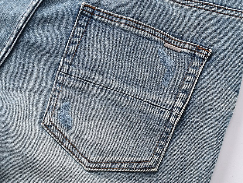 AMIRI Turquoise Embroidered Light Blue Jeans — detail