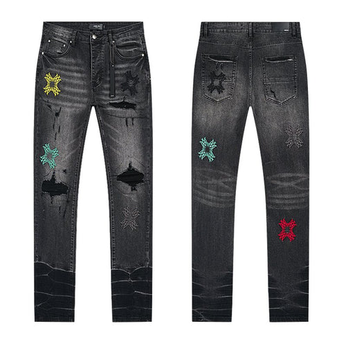 AMIRI Black Distressed Embroidered Jeans — hero