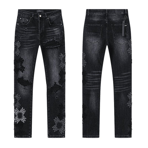 AMIRI Black Floral Distressed Jeans — hero