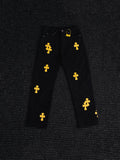 Chrome Hearts Yellow Cross Patch Black Jeans — hero