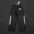 Chrome Hearts Sanskrit Cross Graphic Wide-Leg Pants — hero