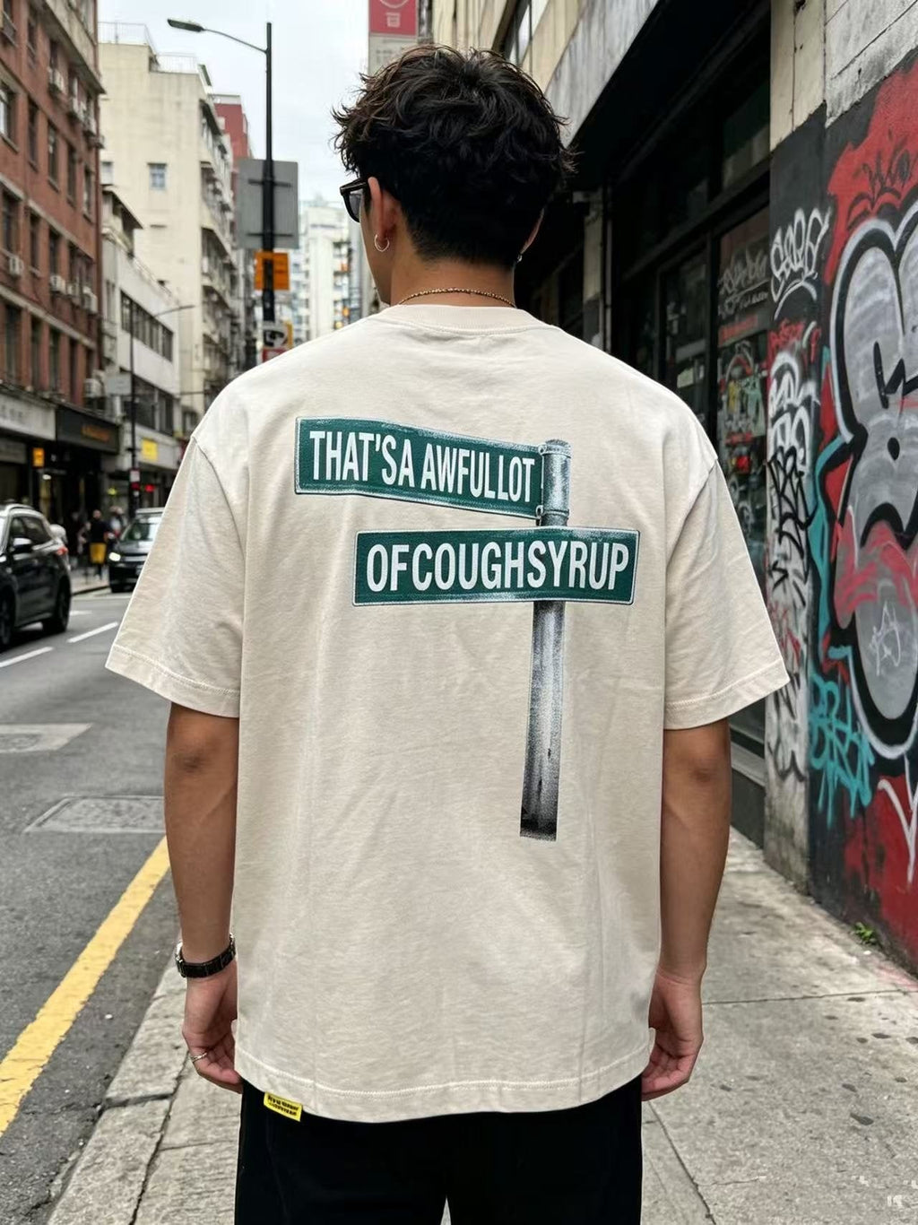 THAT'S A AWFUL LOT OF COUGH SYRUP Short-Sleeve Graphic T-Shirt — model