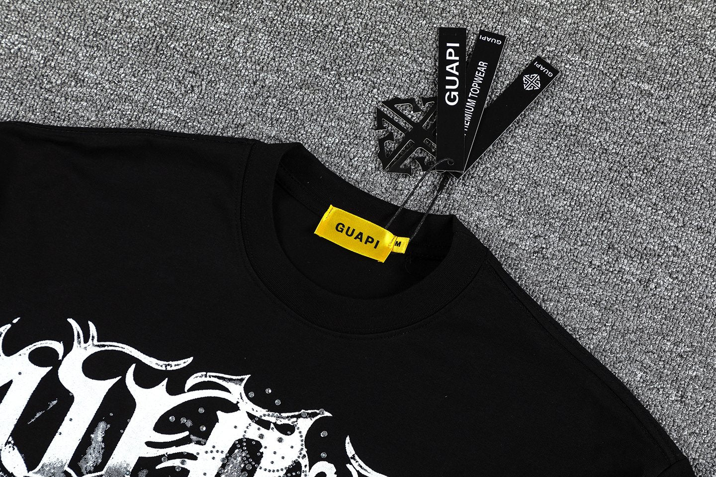 GUAPI Distressed Graphic T-Shirt — hang_tag