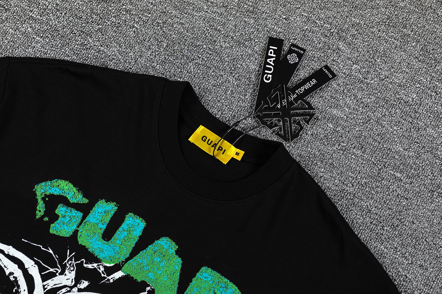 GUAPI Skull Ribcage Graphic T-Shirt — hang_tag
