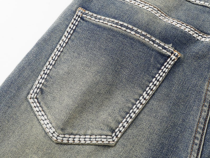 VALABASAS Washed Blue Flared Jeans — detail