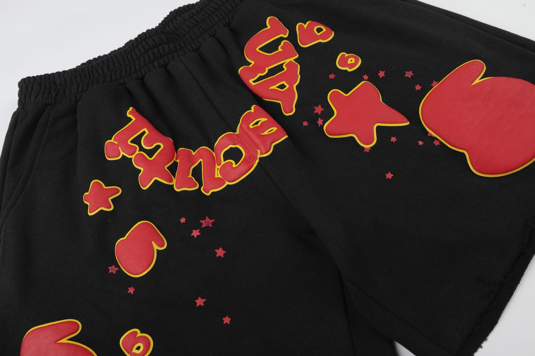 Sp5der Black Graphic Raw-Hem Shorts — detail