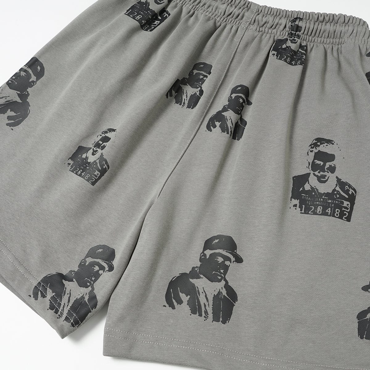 ASAALL All-Over Portrait Graphic Drawstring Shorts — detail